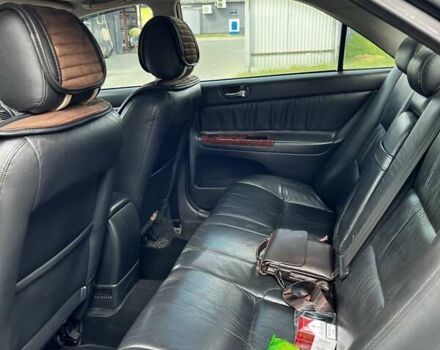 Черный Тойота Камри, объемом двигателя 2.37 л и пробегом 437 тыс. км за 6400 $, фото 19 на Automoto.ua