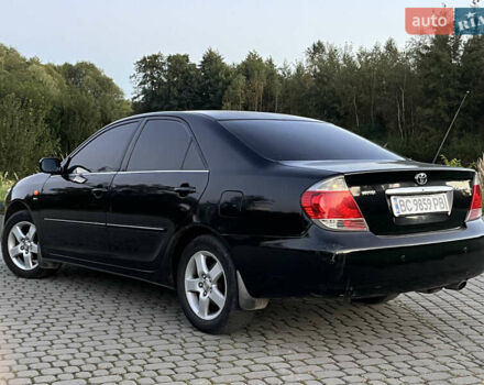 Черный Тойота Камри, объемом двигателя 2.4 л и пробегом 317 тыс. км за 5650 $, фото 5 на Automoto.ua