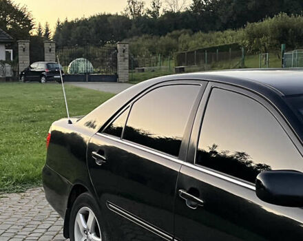 Черный Тойота Камри, объемом двигателя 2.4 л и пробегом 317 тыс. км за 5650 $, фото 2 на Automoto.ua