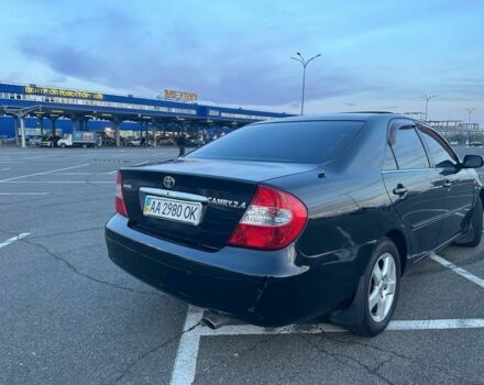 Черный Тойота Камри, объемом двигателя 2.4 л и пробегом 313 тыс. км за 5800 $, фото 14 на Automoto.ua