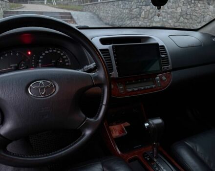 Черный Тойота Камри, объемом двигателя 2.4 л и пробегом 570 тыс. км за 6199 $, фото 5 на Automoto.ua