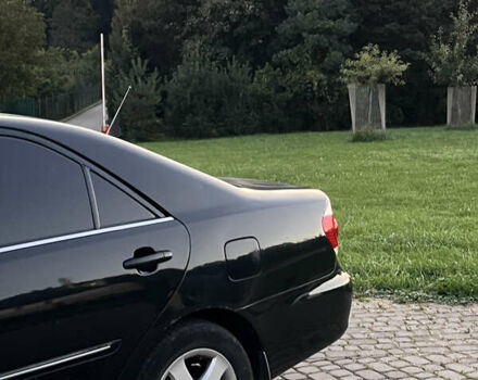 Черный Тойота Камри, объемом двигателя 2.4 л и пробегом 317 тыс. км за 5650 $, фото 6 на Automoto.ua