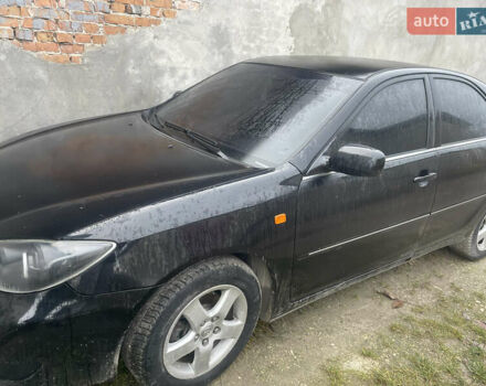 Черный Тойота Камри, объемом двигателя 3 л и пробегом 200 тыс. км за 5800 $, фото 1 на Automoto.ua