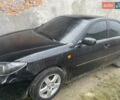 Черный Тойота Камри, объемом двигателя 3 л и пробегом 200 тыс. км за 5800 $, фото 1 на Automoto.ua