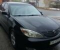 Чорний Тойота Камрі, об'ємом двигуна 3 л та пробігом 200 тис. км за 7000 $, фото 1 на Automoto.ua