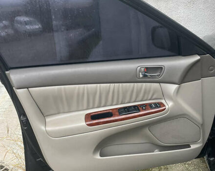 Черный Тойота Камри, объемом двигателя 3 л и пробегом 200 тыс. км за 5800 $, фото 4 на Automoto.ua