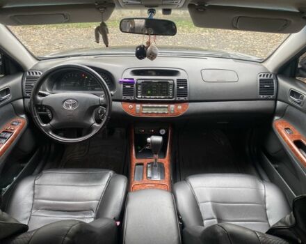 Черный Тойота Камри, объемом двигателя 2.4 л и пробегом 310 тыс. км за 5600 $, фото 6 на Automoto.ua