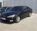 Черный Тойота Камри, объемом двигателя 3 л и пробегом 180 тыс. км за 8800 $, фото 1 на Automoto.ua