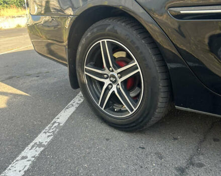 Черный Тойота Камри, объемом двигателя 2.4 л и пробегом 312 тыс. км за 7200 $, фото 4 на Automoto.ua