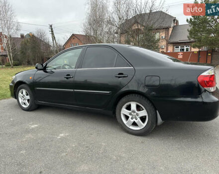Черный Тойота Камри, объемом двигателя 2.4 л и пробегом 553 тыс. км за 5100 $, фото 2 на Automoto.ua