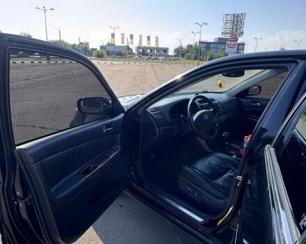 Чорний Тойота Камрі, об'ємом двигуна 3 л та пробігом 285 тис. км за 5500 $, фото 4 на Automoto.ua
