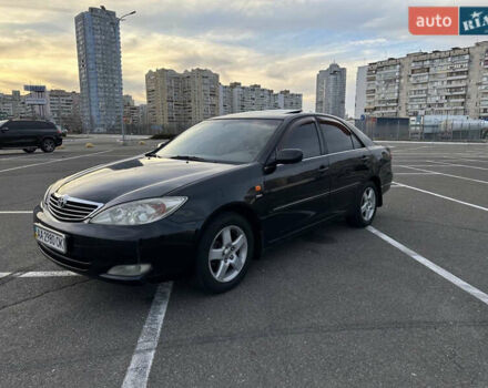 Черный Тойота Камри, объемом двигателя 2.4 л и пробегом 315 тыс. км за 5800 $, фото 6 на Automoto.ua