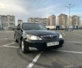 Черный Тойота Камри, объемом двигателя 2.4 л и пробегом 313 тыс. км за 5800 $, фото 1 на Automoto.ua