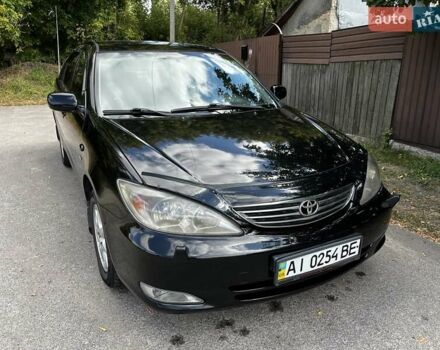 Черный Тойота Камри, объемом двигателя 2.37 л и пробегом 437 тыс. км за 6400 $, фото 32 на Automoto.ua