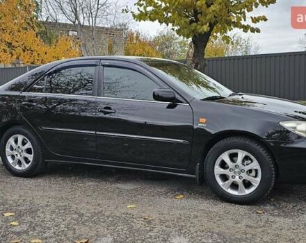Тойота Камри 2004 в Каменское - Днепродзержинск на Automoto.ua Черный Тойота Камри, объемом двигателя 2 л и пробегом 180 тыс. км за 6700 $, фото 6 на Automoto.ua