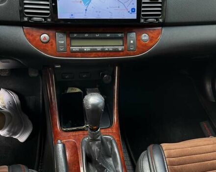 Черный Тойота Камри, объемом двигателя 2.37 л и пробегом 437 тыс. км за 6400 $, фото 23 на Automoto.ua