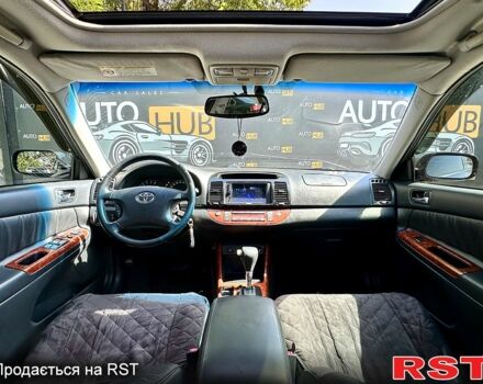 Тойота Камрі 2004 у Харкові на Automoto.ua Чорний Тойота Камрі, об'ємом двигуна 3 л та пробігом 231 тис. км за 5000 $, фото 6 на Automoto.ua