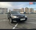 Черный Тойота Камри, объемом двигателя 2.4 л и пробегом 315 тыс. км за 5800 $, фото 1 на Automoto.ua