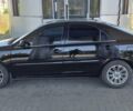 Чорний Тойота Камрі, об'ємом двигуна 2.36 л та пробігом 320 тис. км за 4700 $, фото 1 на Automoto.ua