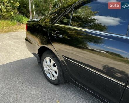 Черный Тойота Камри, объемом двигателя 2.37 л и пробегом 437 тыс. км за 6400 $, фото 11 на Automoto.ua