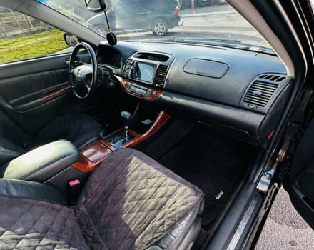 Тойота Камри 2004 в Харькове на Automoto.ua Черный Тойота Камри, объемом двигателя 3 л и пробегом 275 тыс. км за 4999 $, фото 17 на Automoto.ua