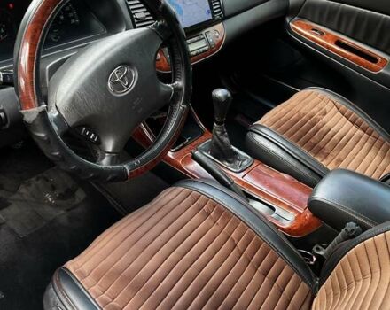 Черный Тойота Камри, объемом двигателя 2.37 л и пробегом 437 тыс. км за 6400 $, фото 20 на Automoto.ua