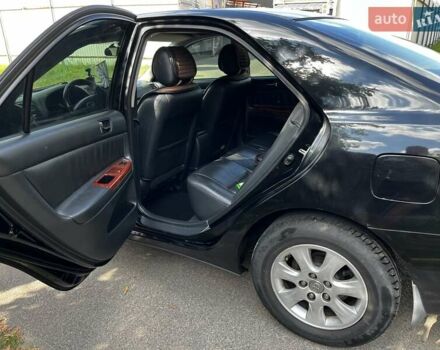 Черный Тойота Камри, объемом двигателя 2.37 л и пробегом 437 тыс. км за 6400 $, фото 16 на Automoto.ua