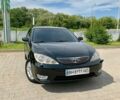 Чорний Тойота Камрі, об'ємом двигуна 3 л та пробігом 320 тис. км за 7900 $, фото 1 на Automoto.ua