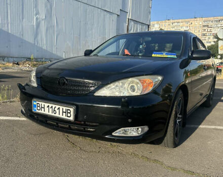 Черный Тойота Камри, объемом двигателя 2.4 л и пробегом 312 тыс. км за 7200 $, фото 2 на Automoto.ua