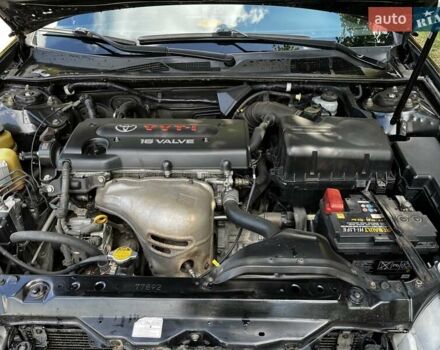 Черный Тойота Камри, объемом двигателя 2.37 л и пробегом 437 тыс. км за 6400 $, фото 14 на Automoto.ua