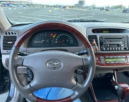 Черный Тойота Камри, объемом двигателя 2.4 л и пробегом 313 тыс. км за 5800 $, фото 10 на Automoto.ua