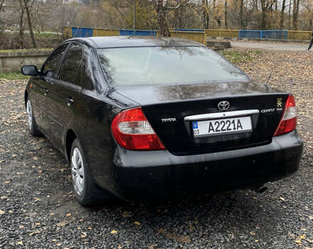Чорний Тойота Камрі, об'ємом двигуна 2.4 л та пробігом 310 тис. км за 5600 $, фото 4 на Automoto.ua