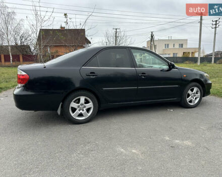 Черный Тойота Камри, объемом двигателя 2.4 л и пробегом 553 тыс. км за 5100 $, фото 3 на Automoto.ua