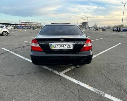 Черный Тойота Камри, объемом двигателя 2.4 л и пробегом 313 тыс. км за 5800 $, фото 4 на Automoto.ua