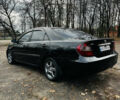 Черный Тойота Камри, объемом двигателя 3 л и пробегом 301 тыс. км за 4500 $, фото 6 на Automoto.ua