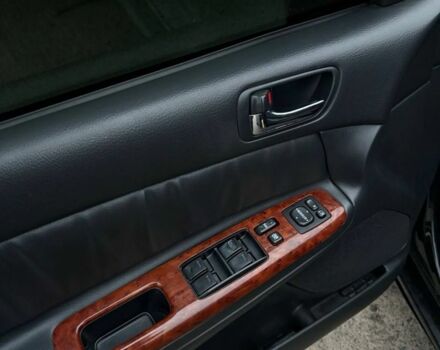 Черный Тойота Камри, объемом двигателя 2.4 л и пробегом 570 тыс. км за 6199 $, фото 1 на Automoto.ua