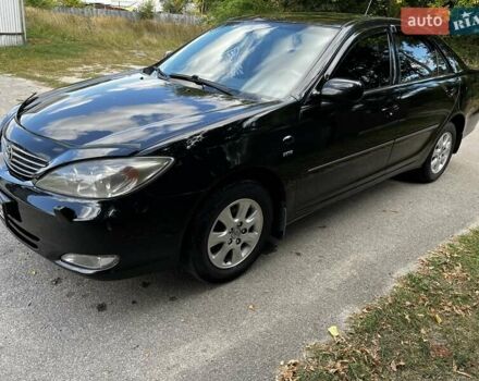 Черный Тойота Камри, объемом двигателя 2.37 л и пробегом 437 тыс. км за 6400 $, фото 34 на Automoto.ua