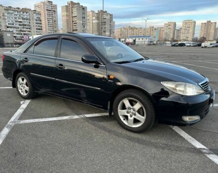 Черный Тойота Камри, объемом двигателя 2.4 л и пробегом 313 тыс. км за 5800 $, фото 2 на Automoto.ua