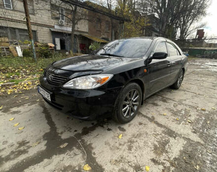 Черный Тойота Камри, объемом двигателя 3 л и пробегом 340 тыс. км за 6700 $, фото 14 на Automoto.ua