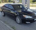 Чорний Тойота Камрі, об'ємом двигуна 2.36 л та пробігом 320 тис. км за 4700 $, фото 5 на Automoto.ua