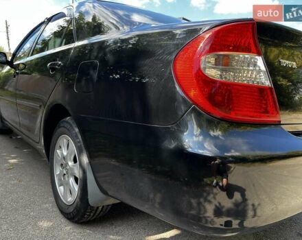 Черный Тойота Камри, объемом двигателя 2.37 л и пробегом 437 тыс. км за 6400 $, фото 7 на Automoto.ua