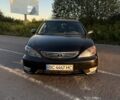 Черный Тойота Камри, объемом двигателя 3 л и пробегом 300 тыс. км за 5000 $, фото 1 на Automoto.ua