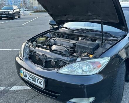 Черный Тойота Камри, объемом двигателя 2.4 л и пробегом 313 тыс. км за 5800 $, фото 19 на Automoto.ua