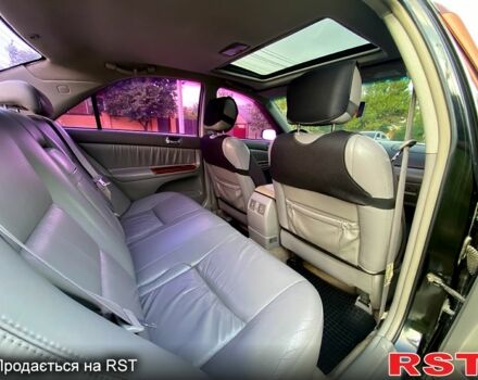 Черный Тойота Камри, объемом двигателя 3 л и пробегом 200 тыс. км за 4500 $, фото 7 на Automoto.ua