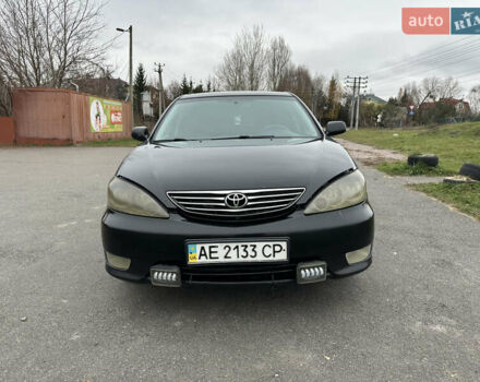 Черный Тойота Камри, объемом двигателя 2.4 л и пробегом 553 тыс. км за 5100 $, фото 1 на Automoto.ua