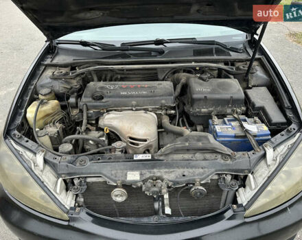 Черный Тойота Камри, объемом двигателя 2.4 л и пробегом 553 тыс. км за 5100 $, фото 12 на Automoto.ua