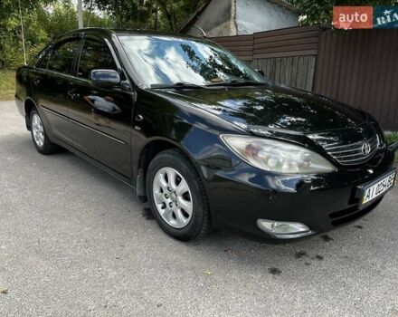 Черный Тойота Камри, объемом двигателя 2.37 л и пробегом 437 тыс. км за 6400 $, фото 31 на Automoto.ua