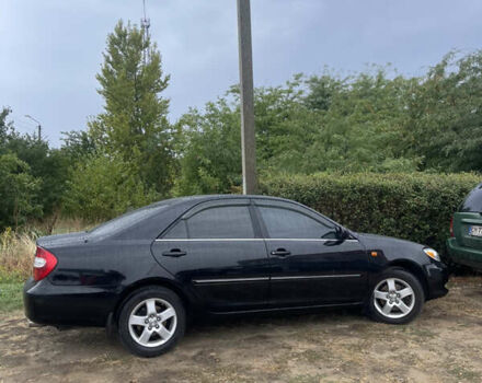 Черный Тойота Камри, объемом двигателя 3 л и пробегом 340 тыс. км за 6700 $, фото 9 на Automoto.ua