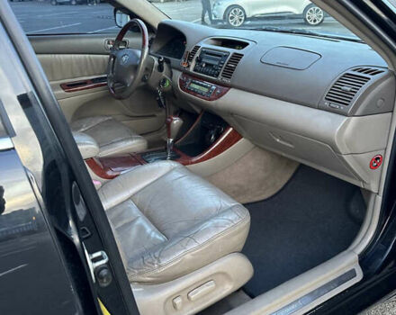 Черный Тойота Камри, объемом двигателя 2.4 л и пробегом 315 тыс. км за 5800 $, фото 17 на Automoto.ua