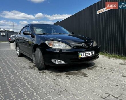 Черный Тойота Камри, объемом двигателя 2.37 л и пробегом 437 тыс. км за 6400 $, фото 2 на Automoto.ua